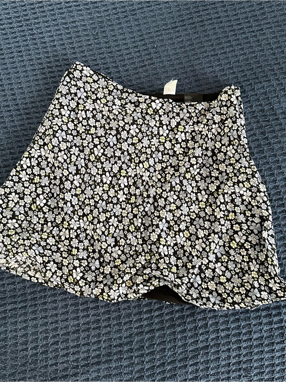 H&M Black Mini Skirt with White and Blue Floral Print